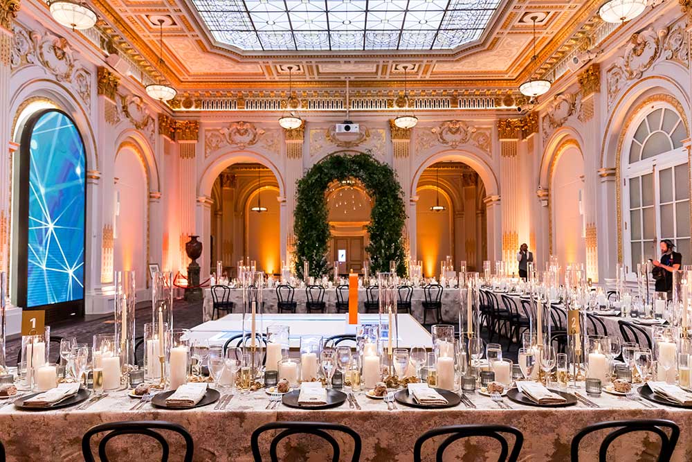 NYSE Board Room - Fiserv reception with candlelit tablescapes