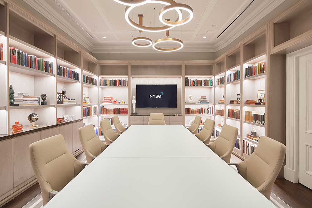 NYSE Library with decorative shelves and a meeting table