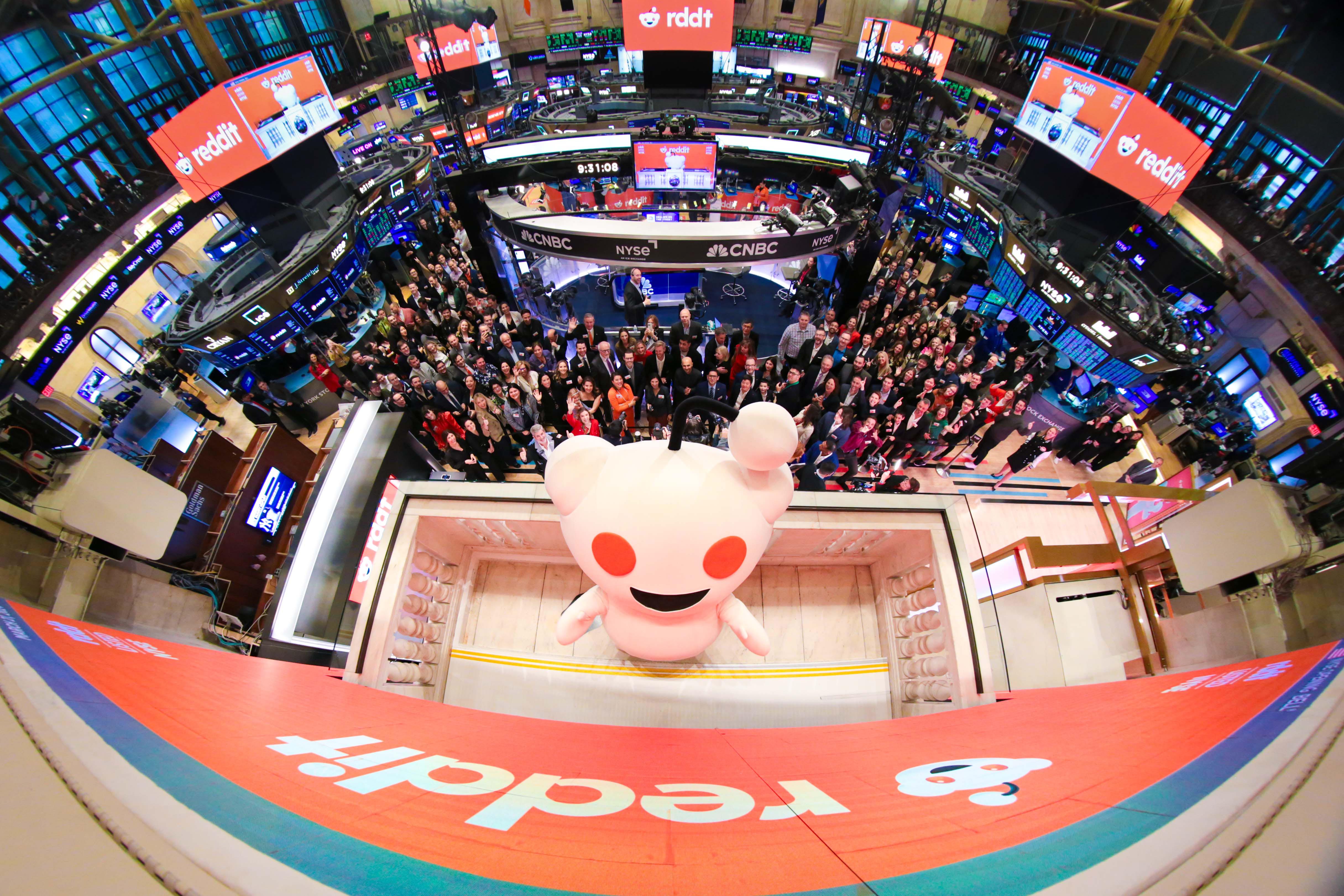 Reddit Snoo ringing the NYSE Opening Bell